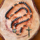 [COMPRE 1 LEVE 2] Terço em Pedras Naturais Hematita Original com os Mistérios do Rosário - 40% de Desconto